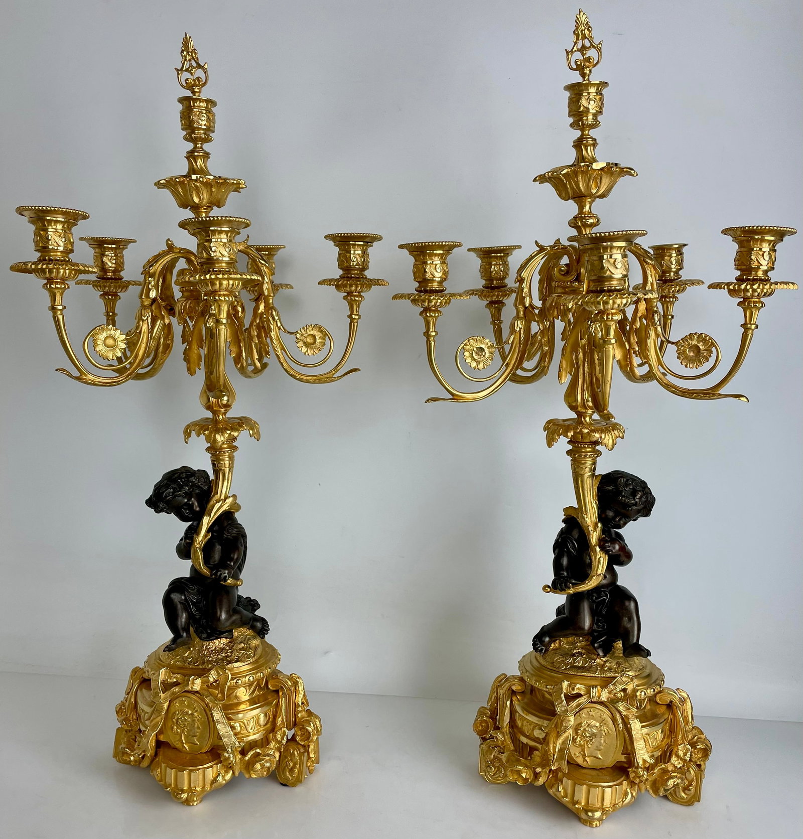 A LARGE PAIR OF 19TH C. ORMOLU & PATINATED BRONZE CANDELABRA: Measure 27.5” high. In excellent condition. Estimate $3000-4000