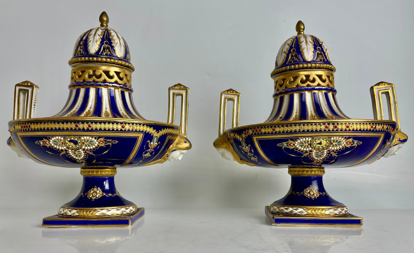 A PAIR OF MAGNIFICENT JEWELLED SEVRES PORCELAIN VASES: Circa 1850. Measure 10” x 9” Estimate $1500-2000