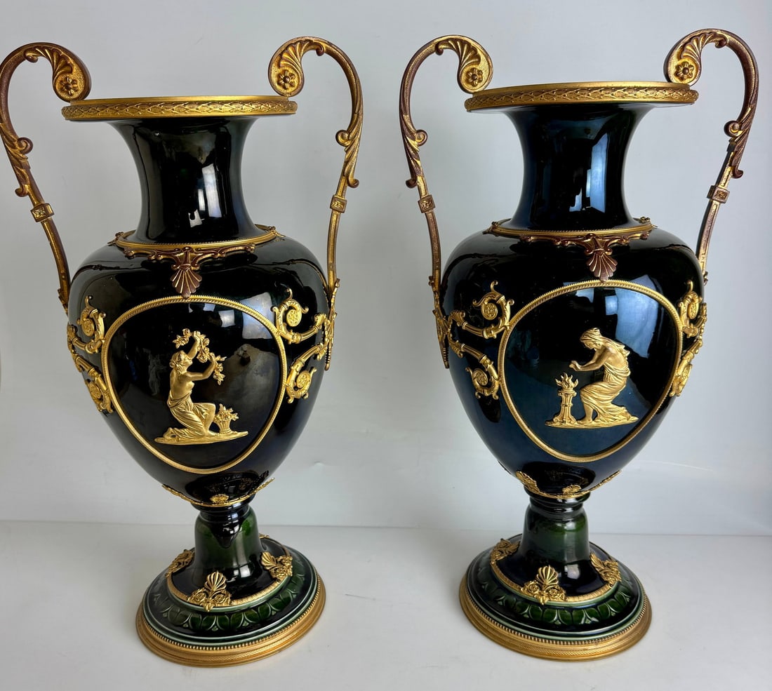 PAIR OF IRIDESCENT GLAZED FAIENCE ORMOLU MOUNTED VASES: Iridescent Glazed Faience Vases with Neoclassical Gilt Bronze Mounts. Measures 22 inches high. In excellent condition . Estimate $6000-8000