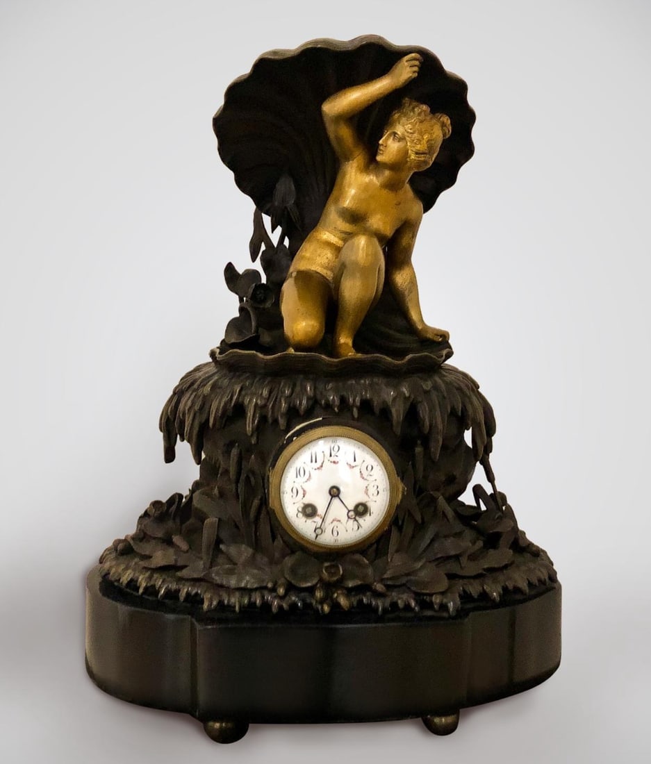A VERY RARE ANTIQUE BRONZE CLOCK: Gilt and patinated bronze . Measures 55cm. In good condition. Estimate $6000-8000