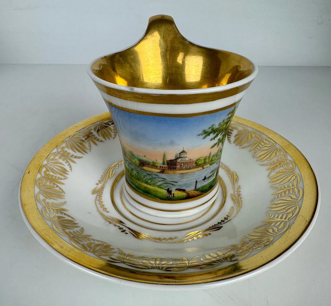 19TH C. BERLIN KPM TOPOGRAPHICAL CUP AND SAUCER: In good condition. Estimate $800-1000