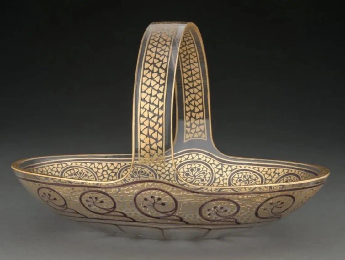 ENAMELED AND GILT MOSER GLASS BASKER: Moser Enameled and Partial Gilt Glass Basket, late 19th century 2-3/8 x 5-3/4 x 2-1/8 inches.In good antique condition, minor gilt loss. Estimate $600-800