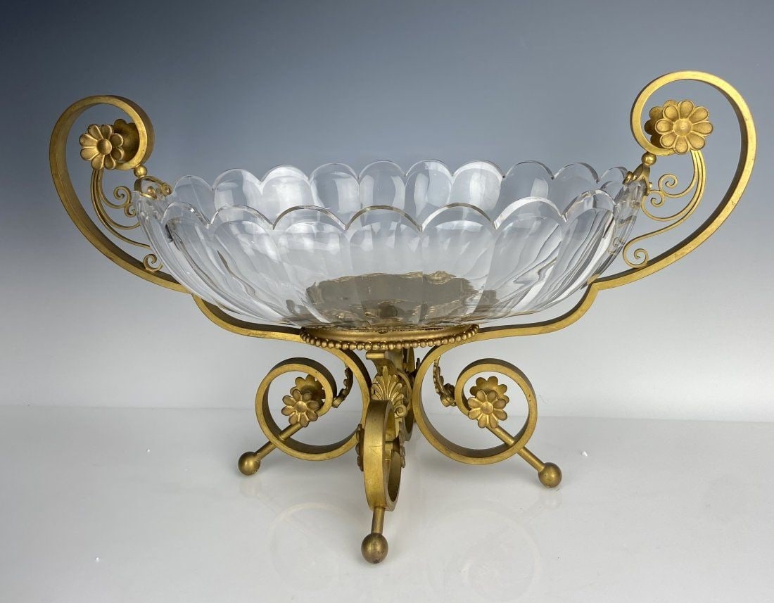 LARGE ORMOLU MOUNTED BACCARAT CENTERPIECE: Circa 1900. Measures 22 inches Long, 13 inches high. Good condition. Estimate $2.500-3.000