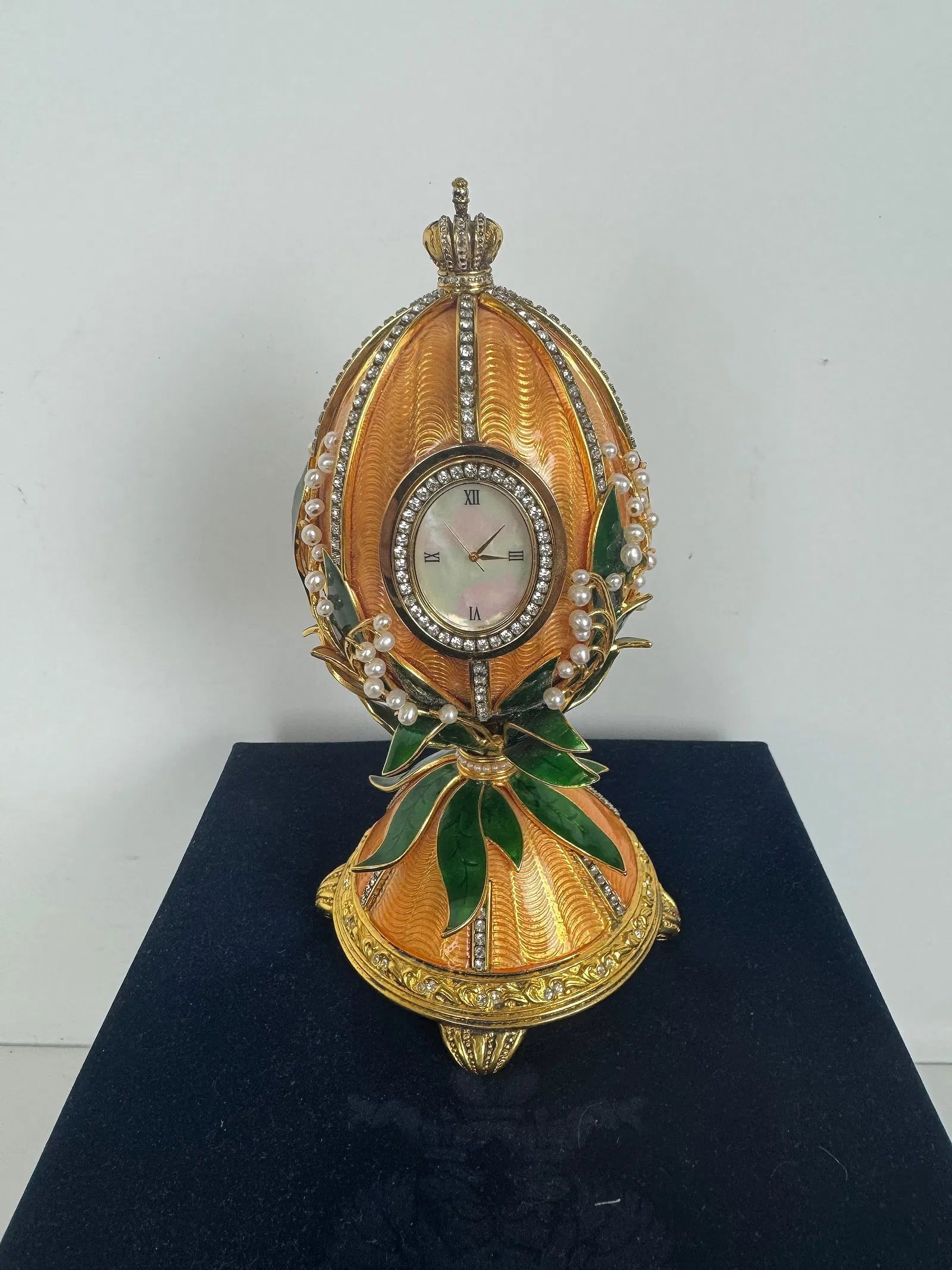 IMPERIAL FABERGE ENAMEL EGG CLOCK: In FABERGE presentation box, enamel in excellent condition. Estimate $4000-5009