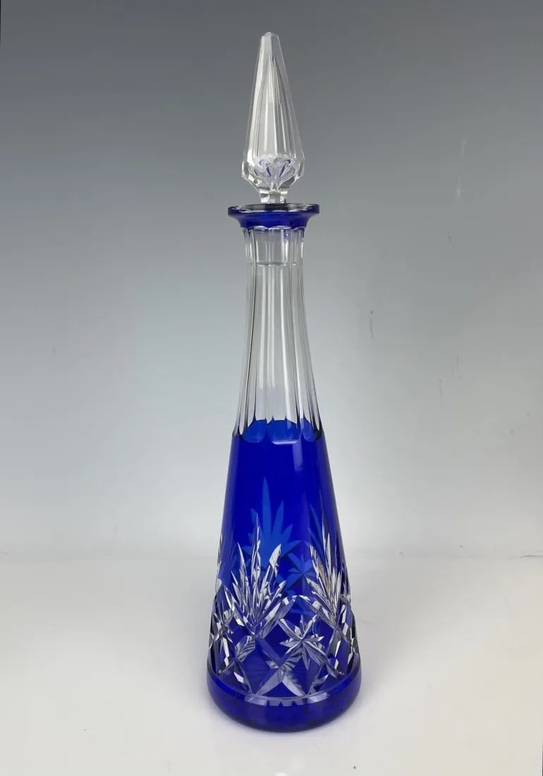 BACCARAT LIQUOR BOTTLE: Measures 12 inches tall. In good used condition. Estimate $400-500