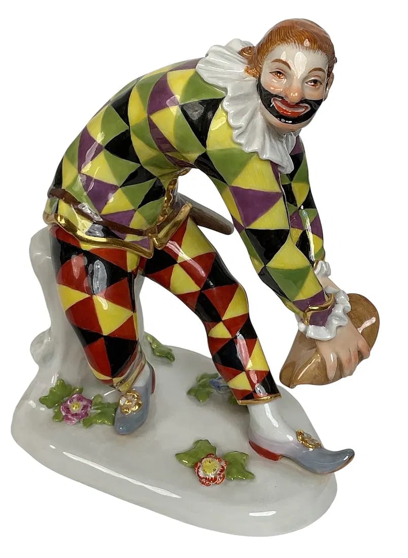 MEISSEN PORCELAIN HARLEQUIN: First quality cross swords mark. Measures 8 inches h. In excellent condition. Estimate $1200-1500