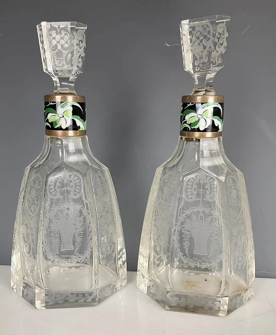A PAIR OF GERMAN ETCHED GLASS AND ENAMEL PERFUME BOTTLES: Circa 1900. Measures 9 inches h. In good condition. Estimate $600-800