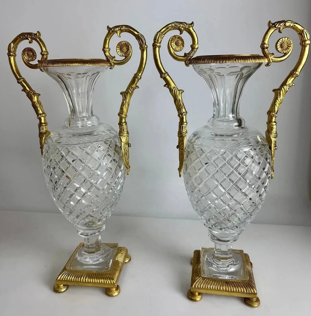 A PAIR OF EMPIRE STYLE ORMOLU MOUNTED BACCARAT STYLE VASES: Measure 16” high. In good condition. Estimate $2000-2500