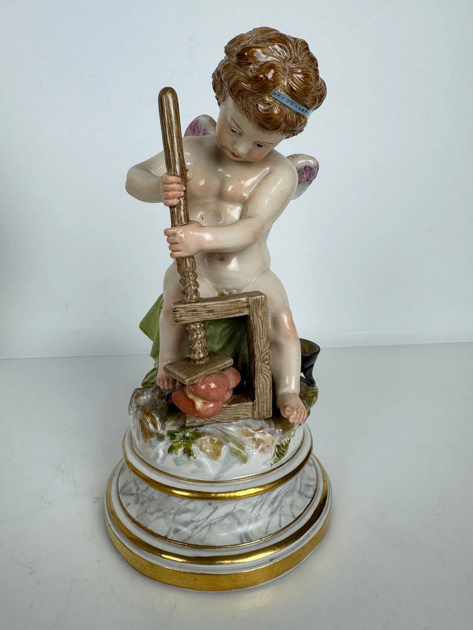 MEISSEN CHERUB L SERIES: Circa 1900. First quality mark. Measures 8 inches h. In excellent condition. Estimate $1000-1200