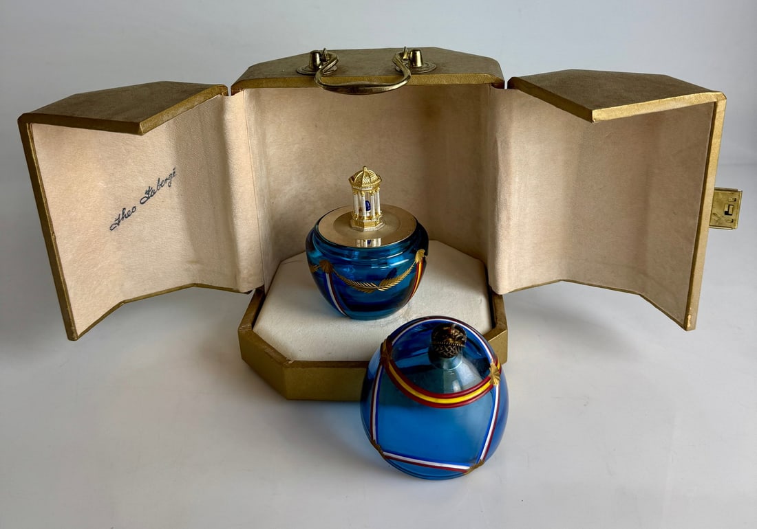 IMPERIAL FABERGE FREINDSHIP EGG: A Theo Fabergé "Friendship" egg made of blue crystal with decoration representing The United States of America and The Soviet Union. The interior surprise is a gazebo form in sterling silver and gold