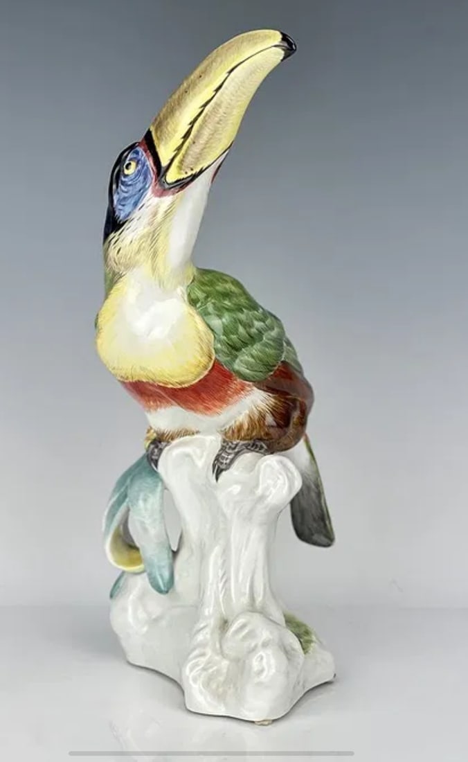 LARGE MEISSEN TUCAN BY PAUL WALTHER: First quality cross swords mark. Measures 12 inches tall. In excellent condition. Estimate $4000-5000