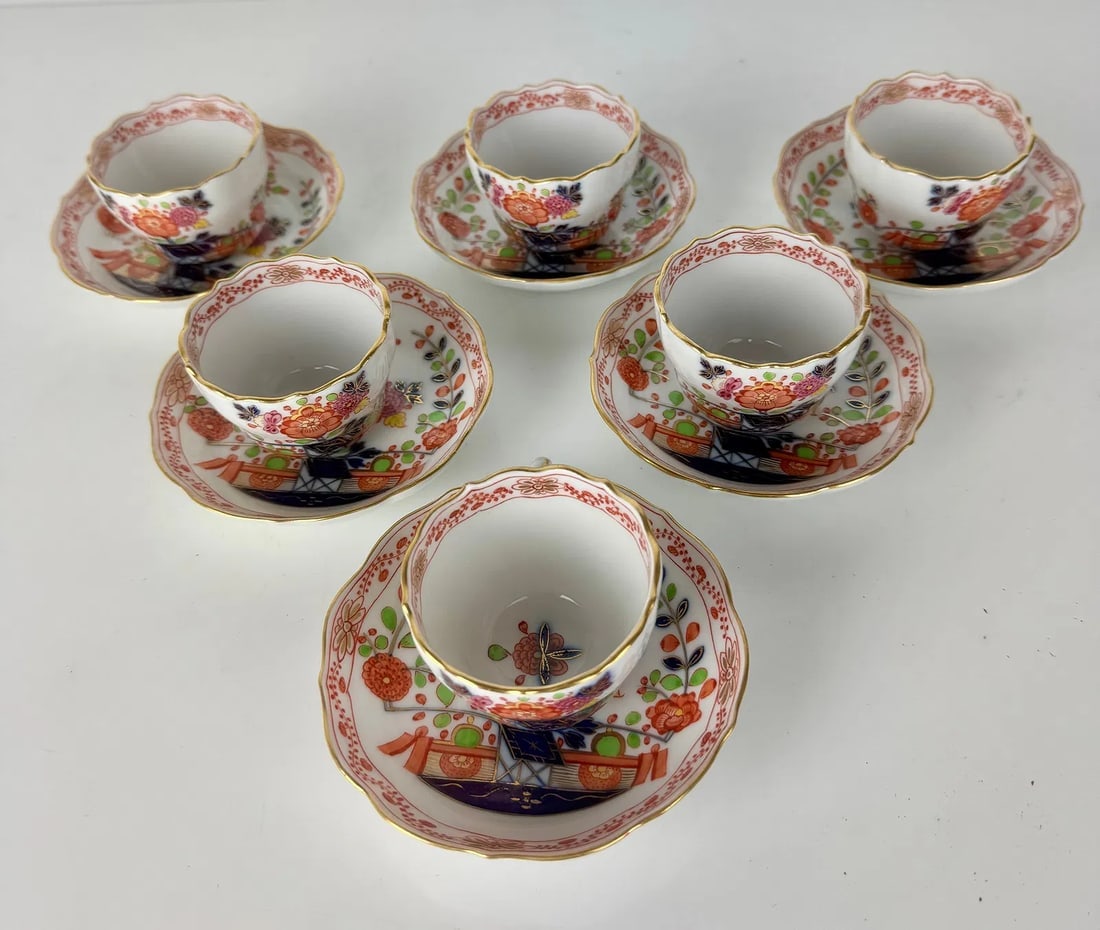 SET OF 6 MEISSEN KAKIEMON PATTERN DEMITASSE CUP AND SAUCERS: Circa 1900. All with first quality cross swords marks, and in excellent condition.Estimate $1500-2000