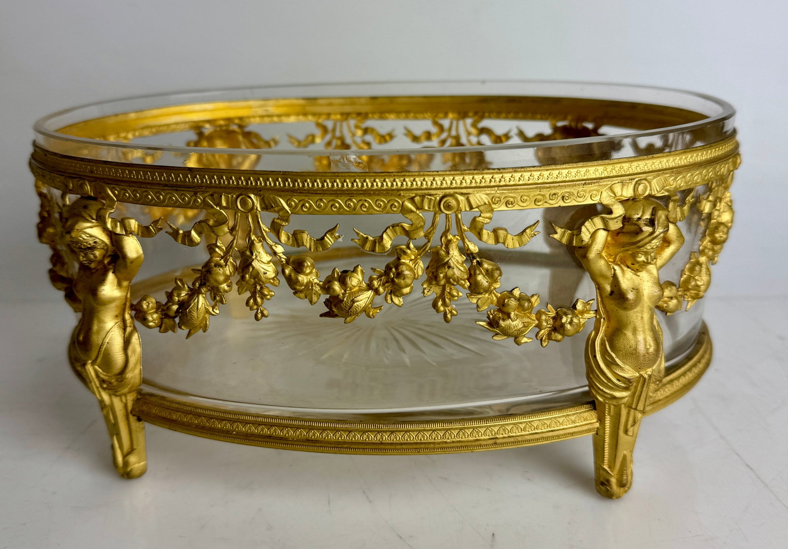 A FINE ORMOLU MOUNTED BACCARAT OVAL BOWL: Circa 1900. Measures 10.2” x7”x5” h. Estimate $2000-2500