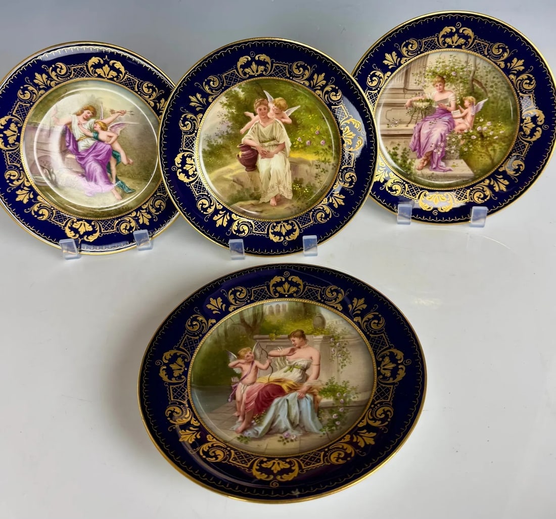 SET OF 4 ROYAL VIENNA PLATES: Circa 1900. Measure 7 inches d. Two signed Hauser. All in good condition. Estimate $1000-1200