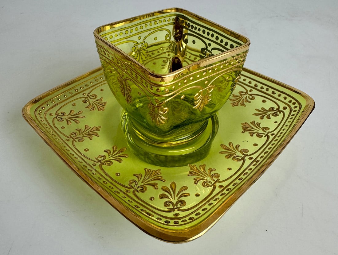 19TH C. MOSER CUP AND SAUCER: Enameand gilt cup and saucer. Excellent condition. Estimate $400-600