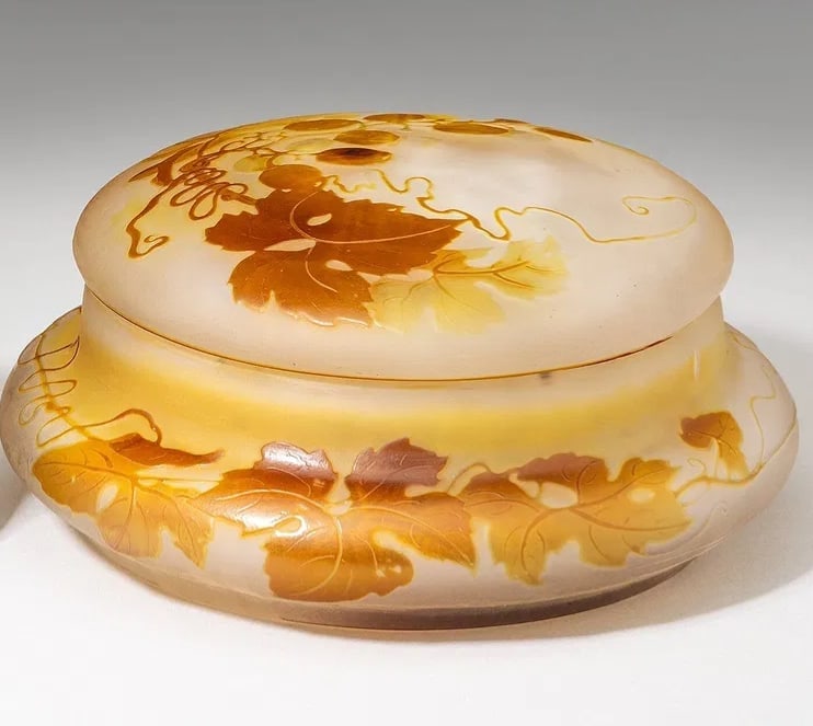 GALLE CAMEO GLASS BOX AND COVER: Circa 1900. Signed Galle. Measures 6.5 inches D. In perfect condition. Estimate $800-1000