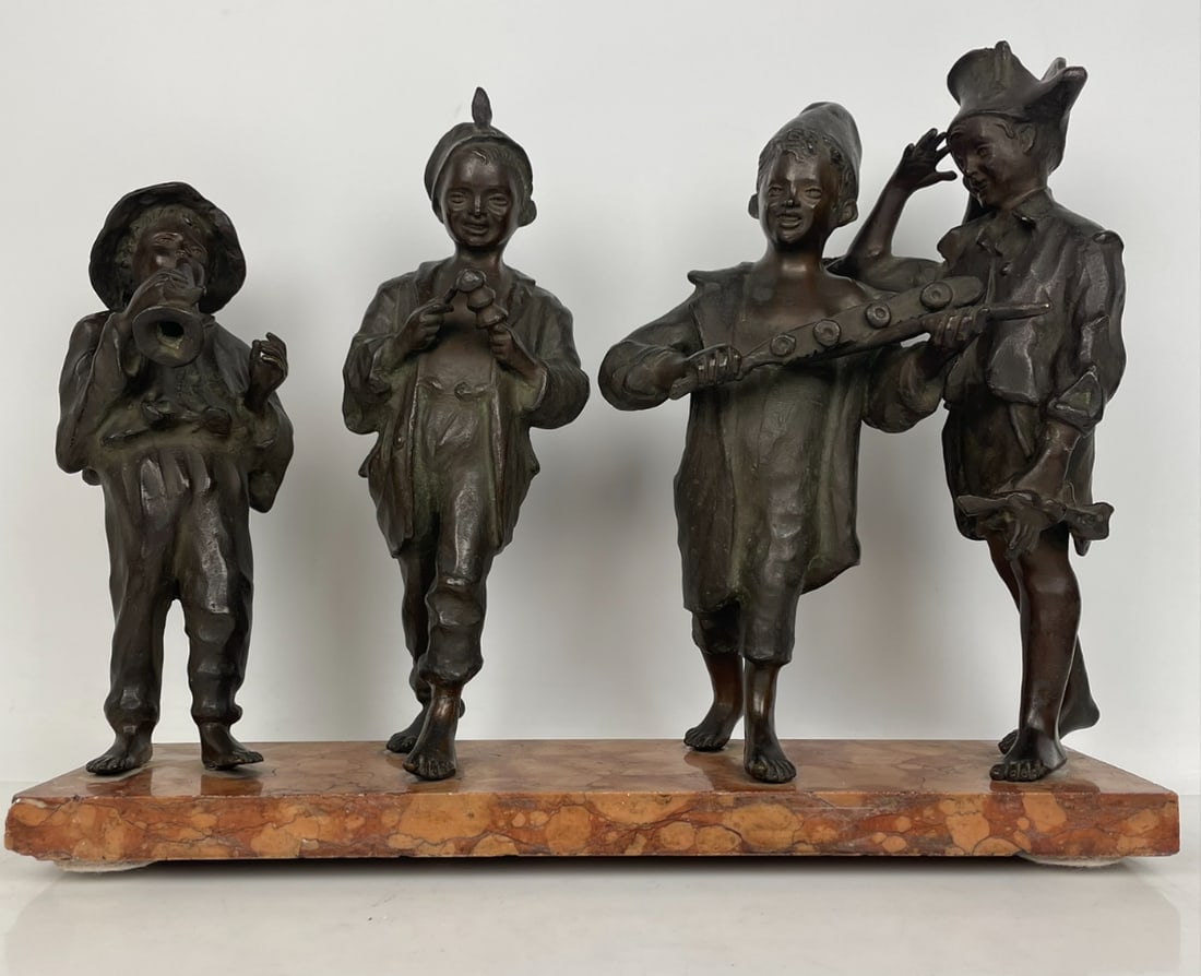 BRONZE SCULPTURE OF 4 MUSICIANS ON A MARBLE BASE: Dimensions : 15.5 inches x5 inches x 11 inches high. Estimate $800-1000