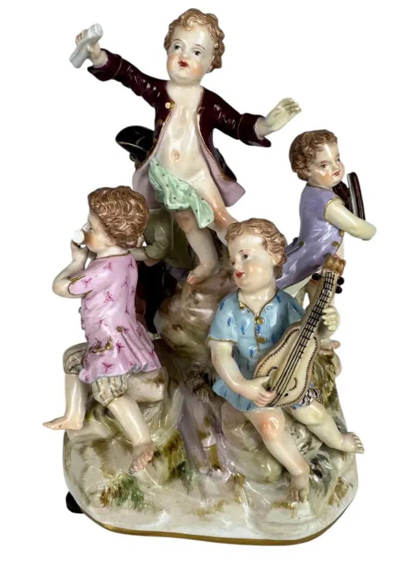 19TH C. MEISSEN GROUP OF MUSICIANS: First quality cross swords mark. Measures 6.5 inches h. In excellent condition. Estimate $1000-1200