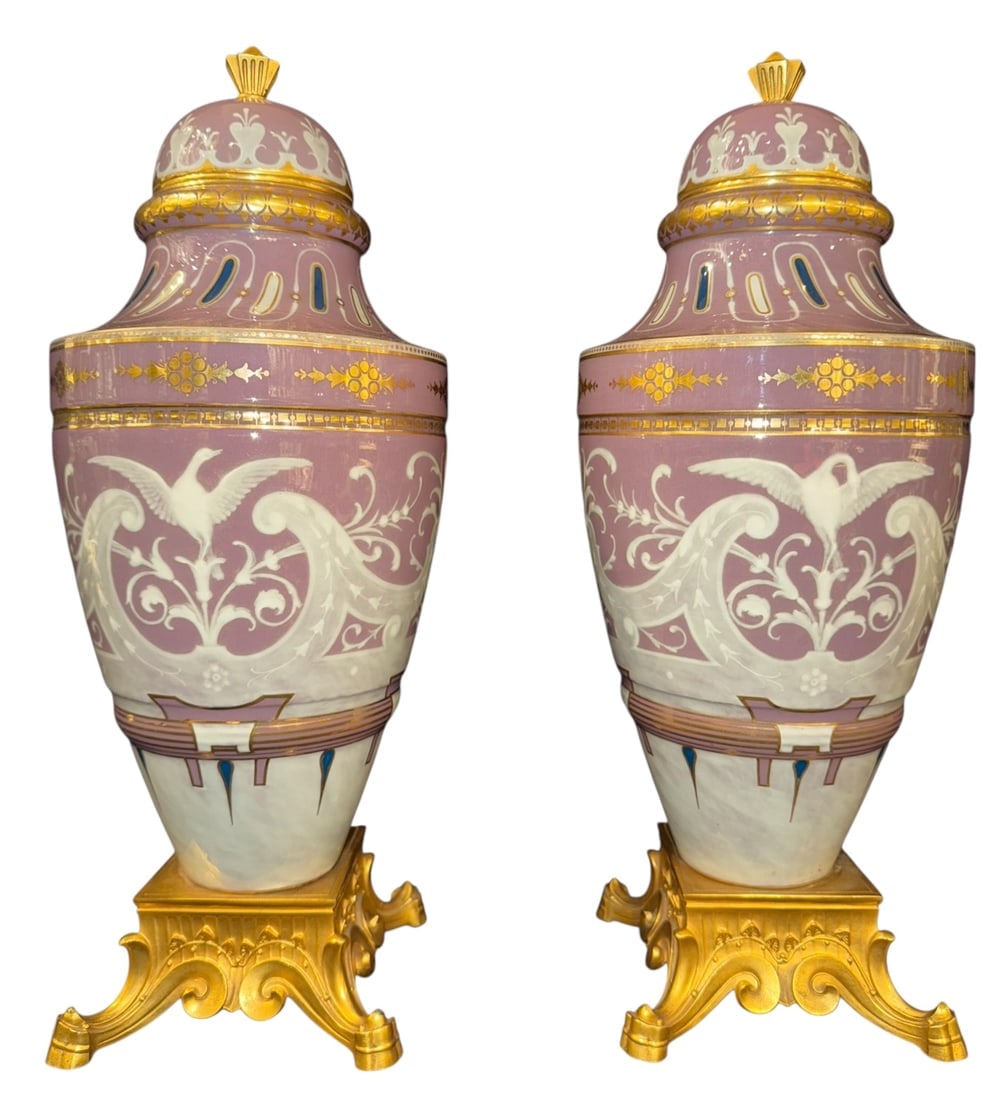 A MAGNIFICENT PAIR OF ORMOLU MOUNTED SEVRES PATE SUR PATE VASES: Circa 1868. With makers initials AD. In excellent condition. Estimate $50.000-60.000