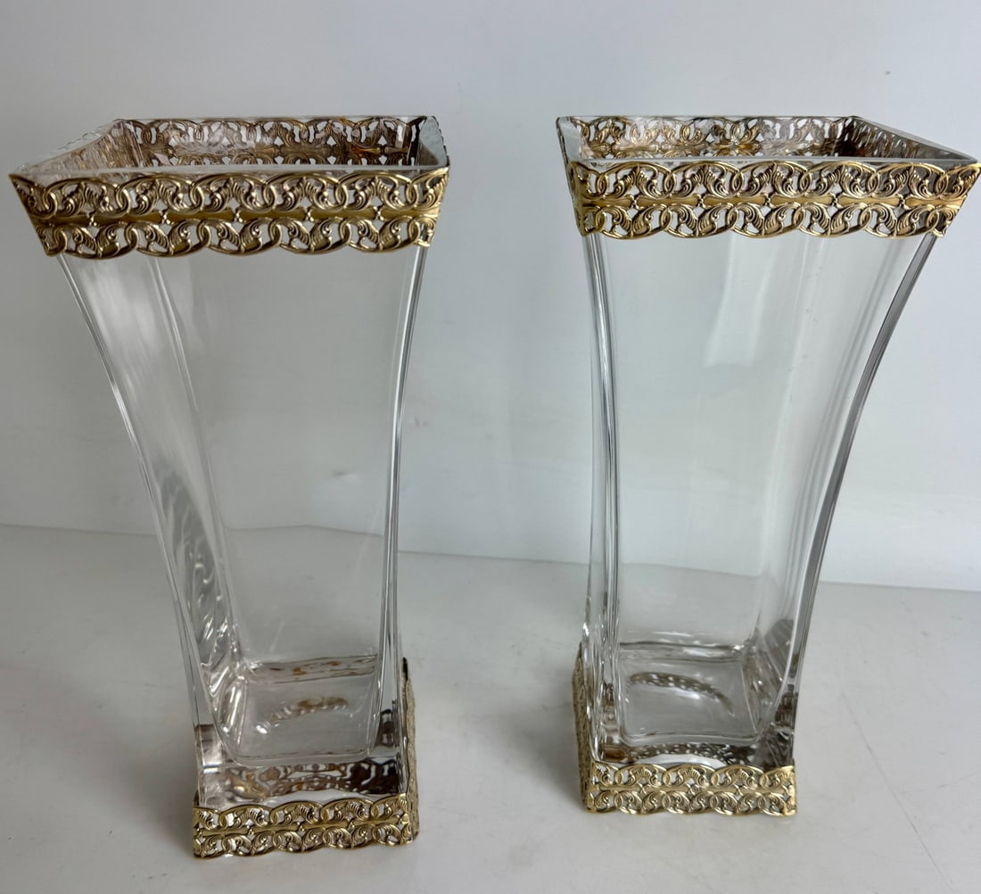 A LARGE PAIR OF STERLING MOUNTED BACCARAT CRYSTAL VASES: Circa 1900. Measures 12” high. Stamped 925. In excellent condition. Estimate $2000-2500