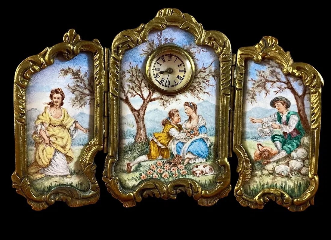 AUSTRIAN ENAMEL SCREEN CLOCK: Circa 1900. Measures 4 inches across, 3 inches h. In good condition. Estimate $800-1000