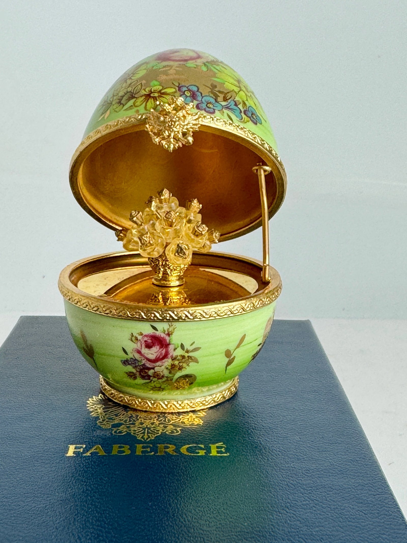IMPERIAL FABERGE LIMOGE PORCELAIN EGG FLOWER BOUQUET: In original presentation box. Measures 4.5 inches . Excellent condition. Estimate $1000-1500