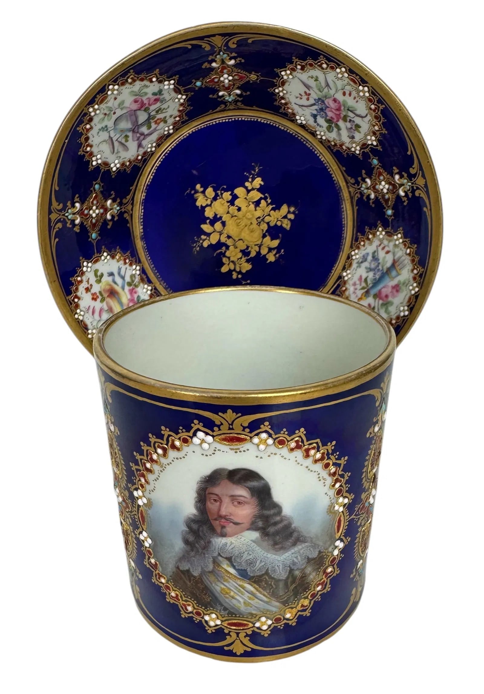 A MAGNIFICENT JEWELLED SEVRES CUP AND SAUCER: Circa 1800. In excellent condition, Estimate $2500-3000
