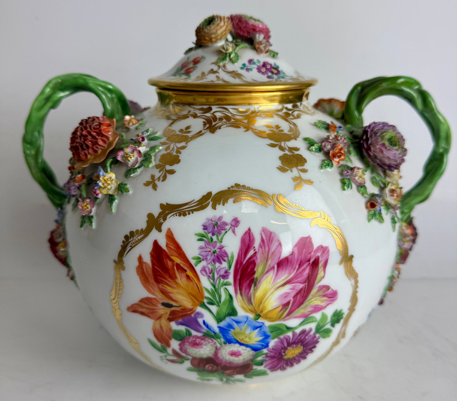 19TH C. MEISSEN JAR AND COVER: First quality. Measures 11” l., 9.5” h. In good antique condition. Minor lass of flower petals, consistent with age. Estimate $2500-3000
