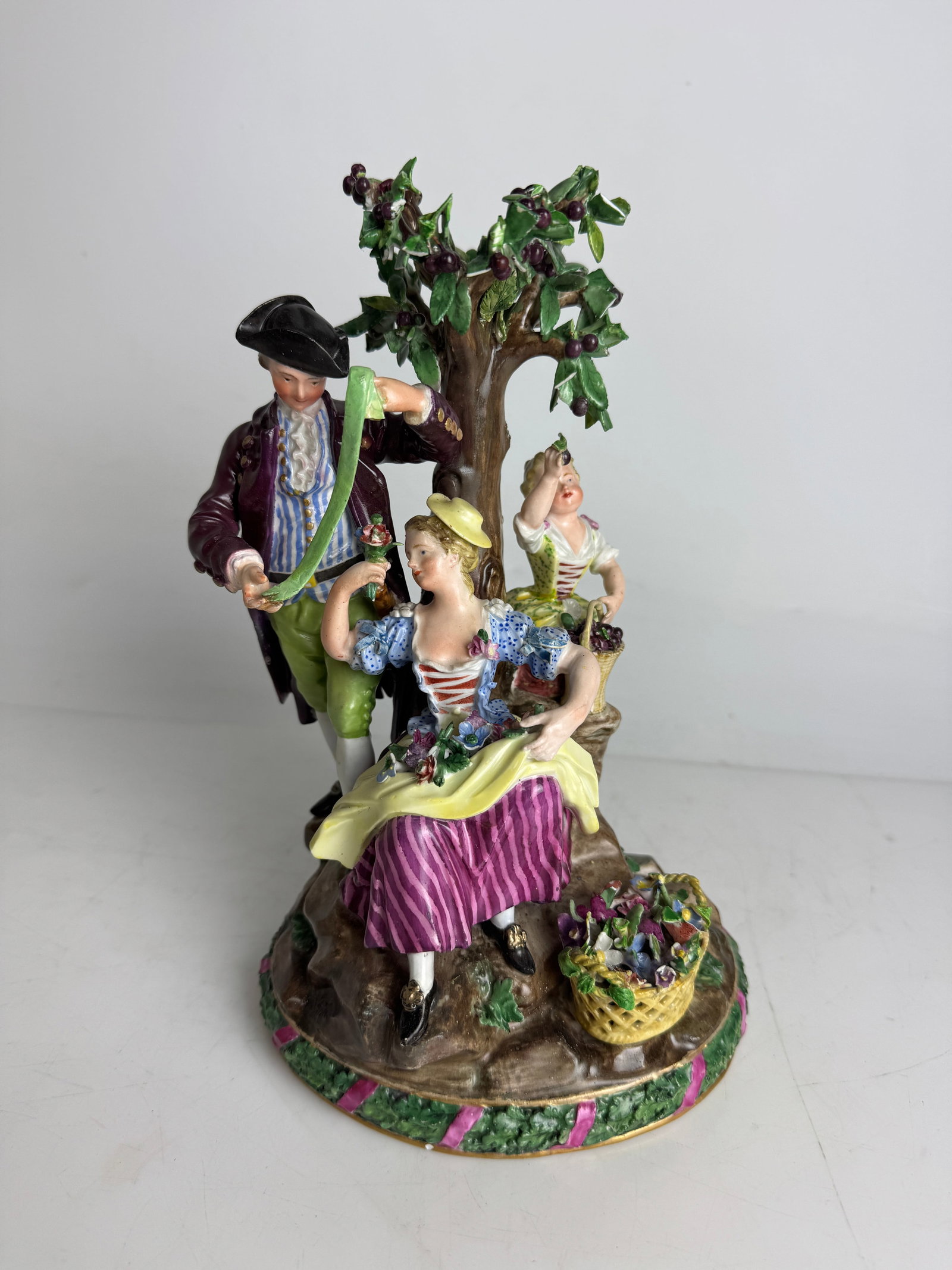 19TH C. MEISSEN GROUP: Measures 10” h. Loss of some petals, otherwise in good condition. Estimate $800-1000