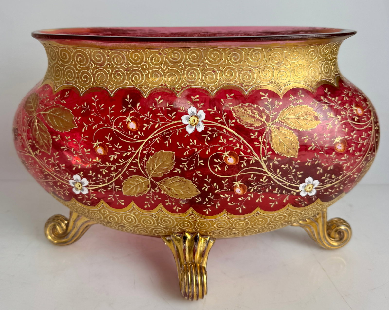 A LARGE GILT AND ENAMELLED MOSER VASE: Circa 1900. Measures 10” L., 6” h. Estimate $600-800