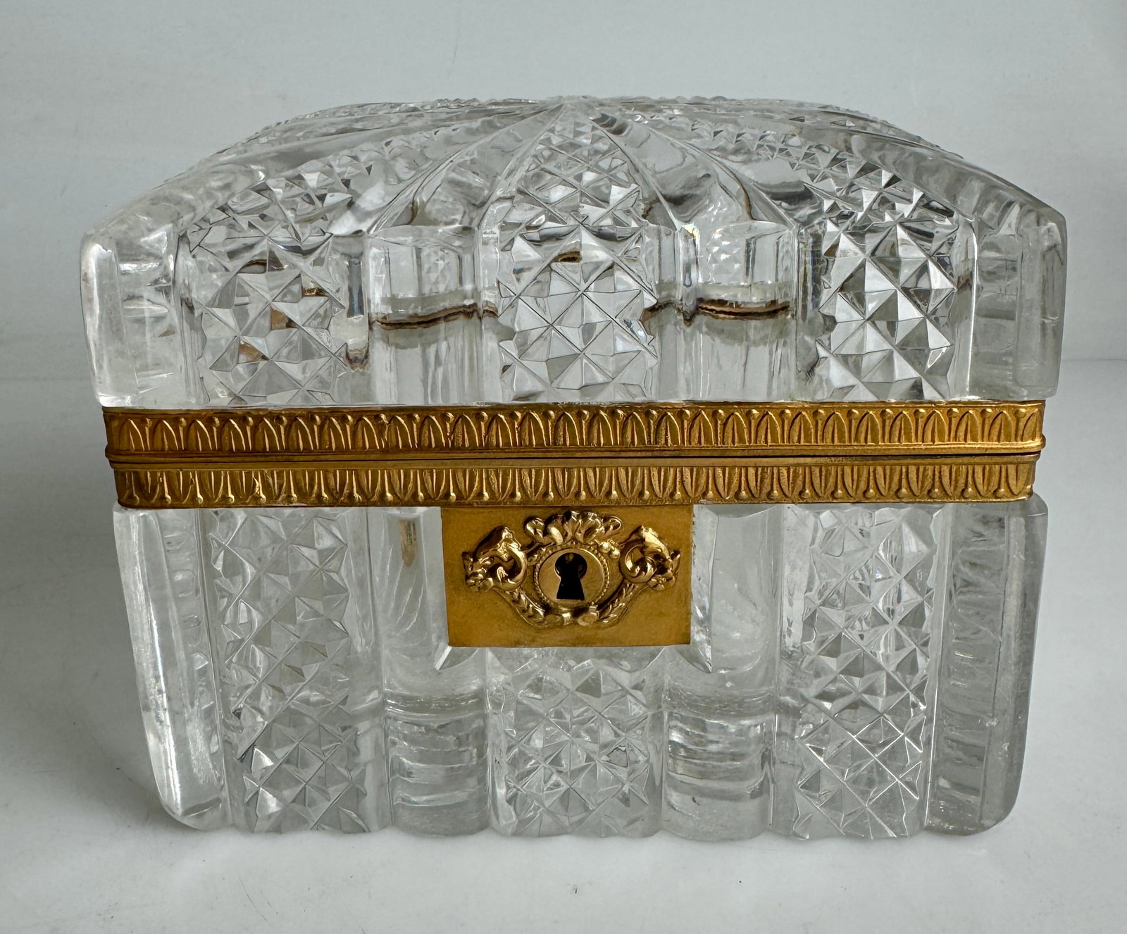 ORMOLU MOUNTD BACCARAT CRYSTAL BOX WITH KEY: Circa 1900. Measures 5.5”x4.5”x3.5” h. Ikey works . In excellent condition. Estimate $2000-2500
