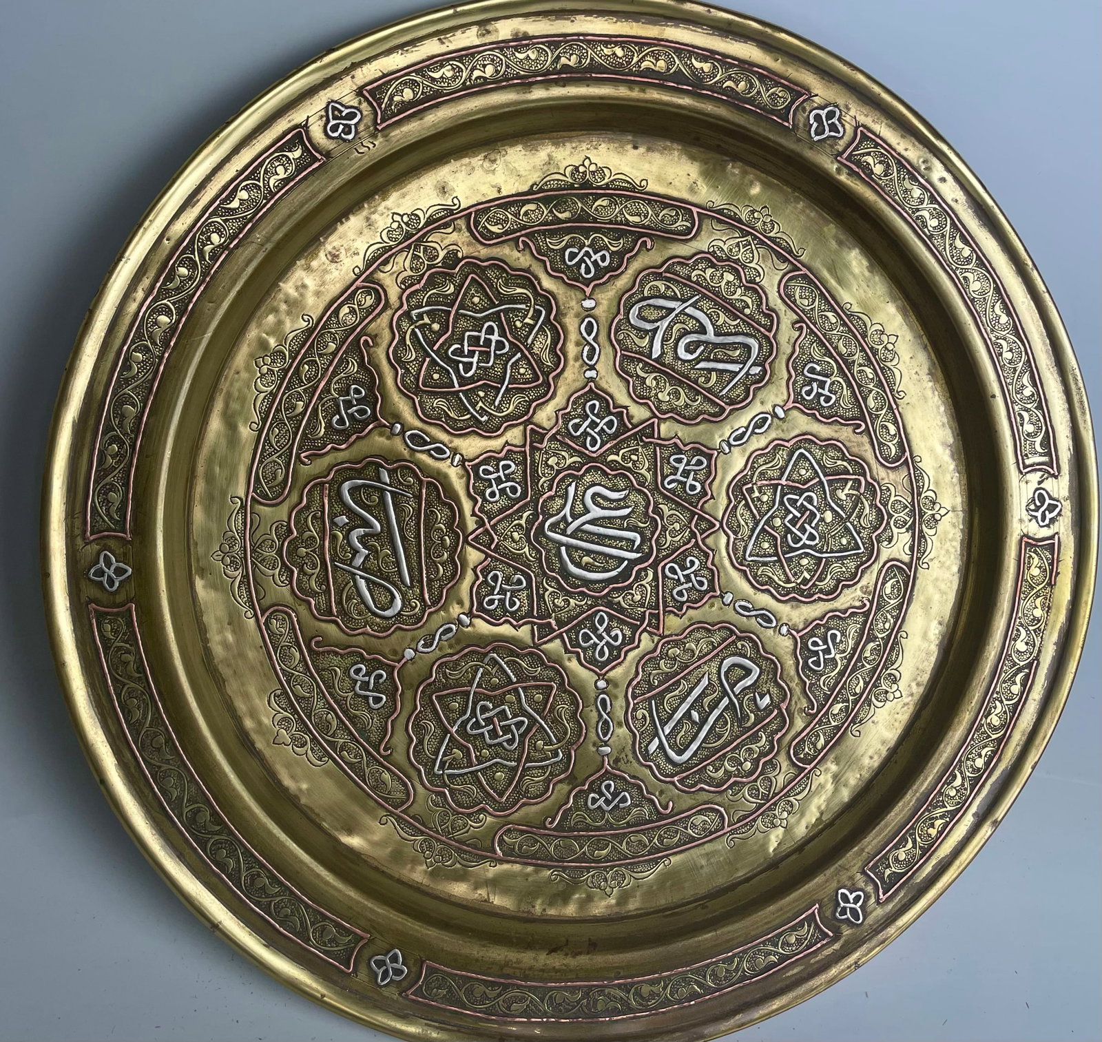 ISLAMIC SILVER INLAID PLATTER: Measures 13”. D. Estimate $600-800