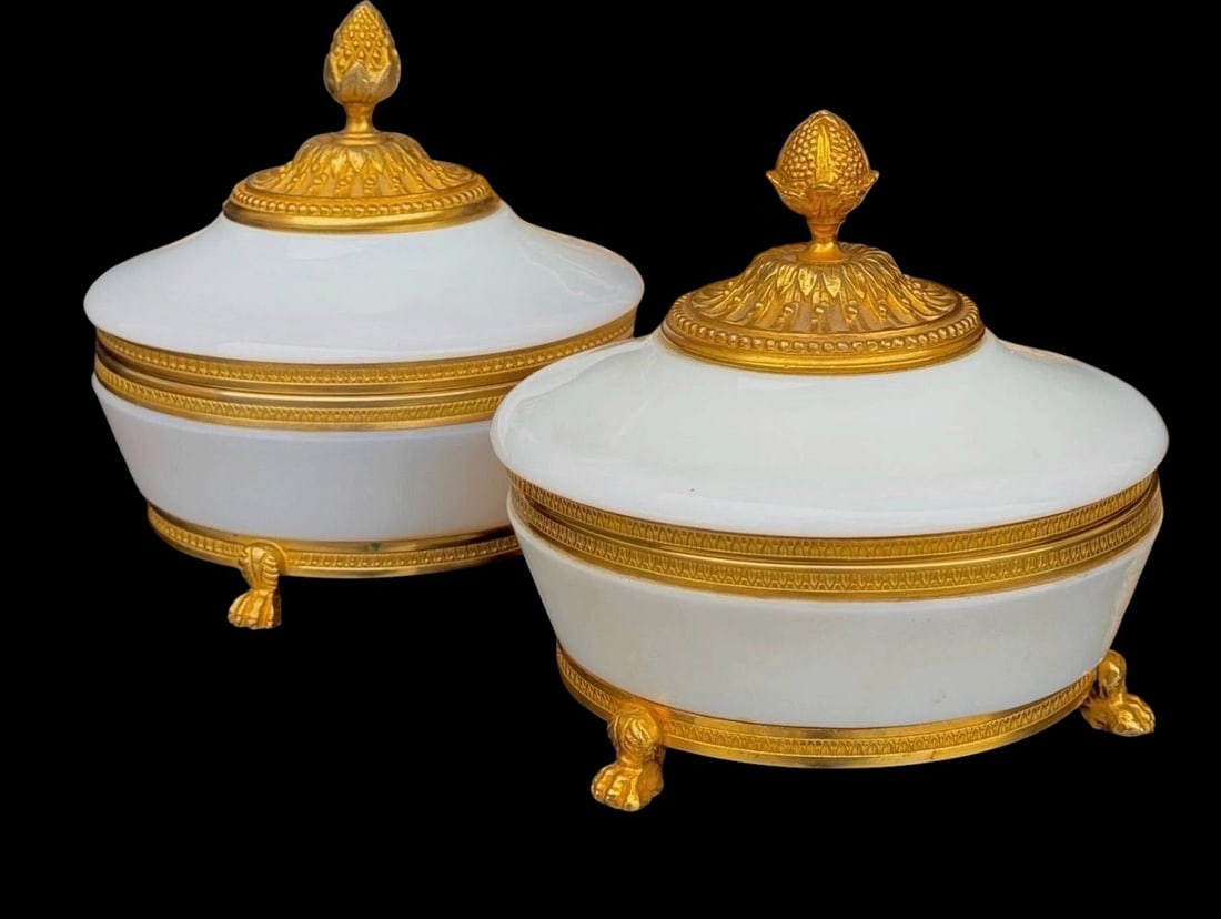 A FINE PAIR OF ORMOLU MOUNTED BACCARAT BOXS: Circa 1900. Measure 5” d., 6” h. In excellent condition. Estimate $2500-3000