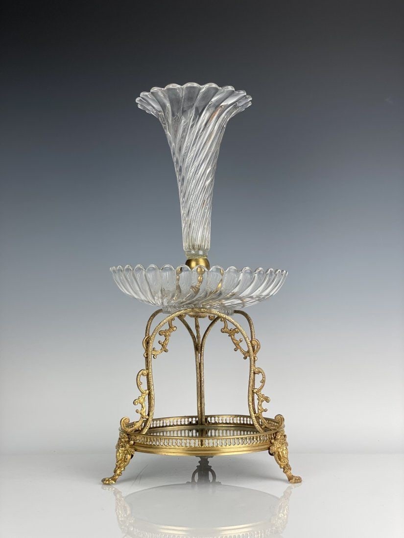A LARGE ORMOLU AND BACCARAT CRYSTAL CENTREPIECE: Circa 1900. Crystal stamped Depose. Measures 18 inches tall, baccarat crystal 8 inches D. Good condition.Estimate $1.000-1.200