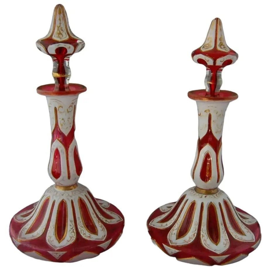 A LARGE PAIR OF MOSER GLASS PERFUME BOTTLES: Circa 1900. Measure 9.5 inches tall . No breaks, no damage. Estimate $1.000-1.200