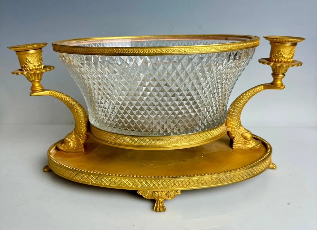 AN EMPIRE STYLE ORMOLU AND BACCARAT CRYSTAL CENTERPIECE: Circa 1900. Measures 16 inches l. In good condition, no damage , no restoration. Estimate $1.500-2.000
