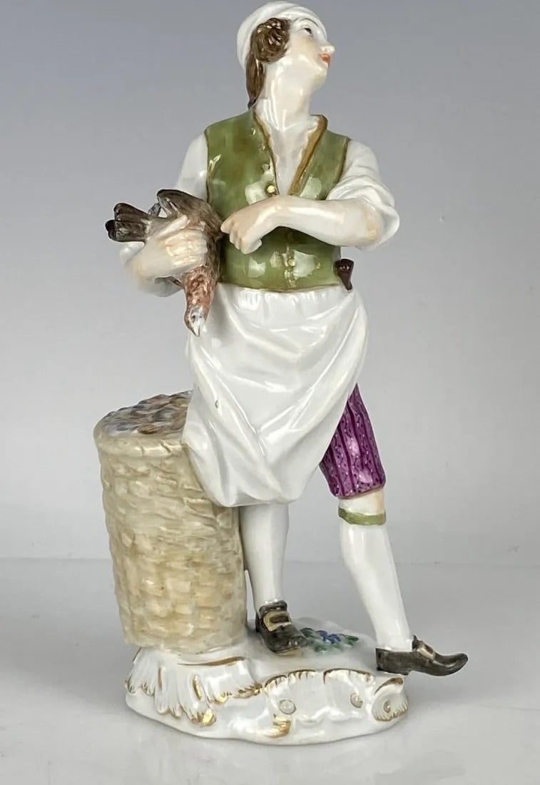 19TH C. MEISSEN FIGURE: First quality cross swords mark. Measures 5.8 inches high. Good condition.Estimate $600-800