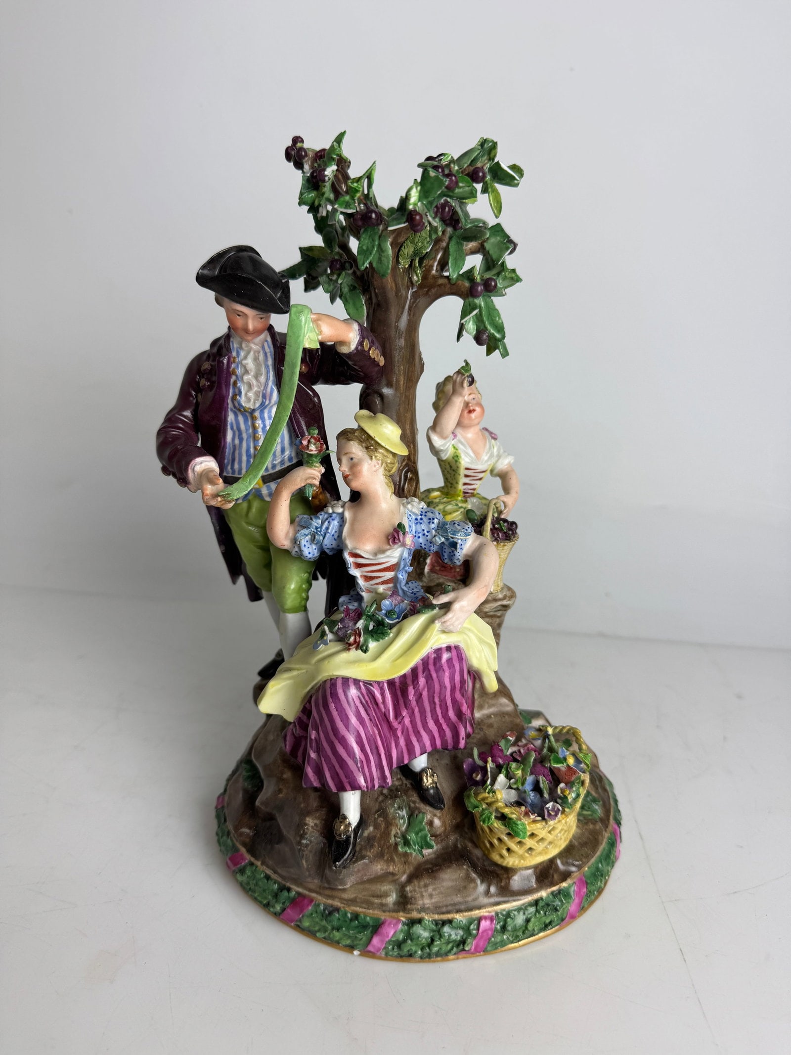 19TH C. MEISSEN GROUP: Measures 10 inches h. Loss of some petals, otherwise in good condition. Estimate $800-100