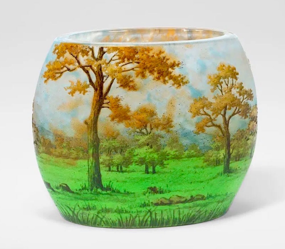 DAUM NANCY VASE: DAUM Nancy 'Paysage', vase, circa 1904 Enamel overlaid and cut glass, decorated with a landscape scene. 8 cm high, 10.5 cm wide, 5 cm deep Signed to the base DAUM NANCY and marked with the Cross of Lo