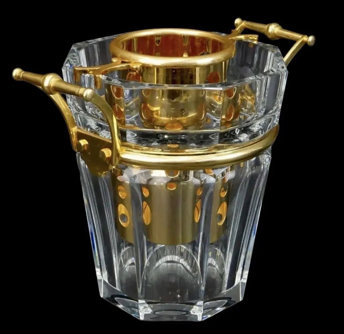 LARGE BACCARAT HARCOURT ICE BUCKET: Large Baccarat "Harcourt" Crystal Champagne / Wine Bucket with Gilded Metal Mounts. Bottle holder insert included in the lot. Measures 9-1/2" x 11-1/4" (w/handle). Condition:very Good condition.