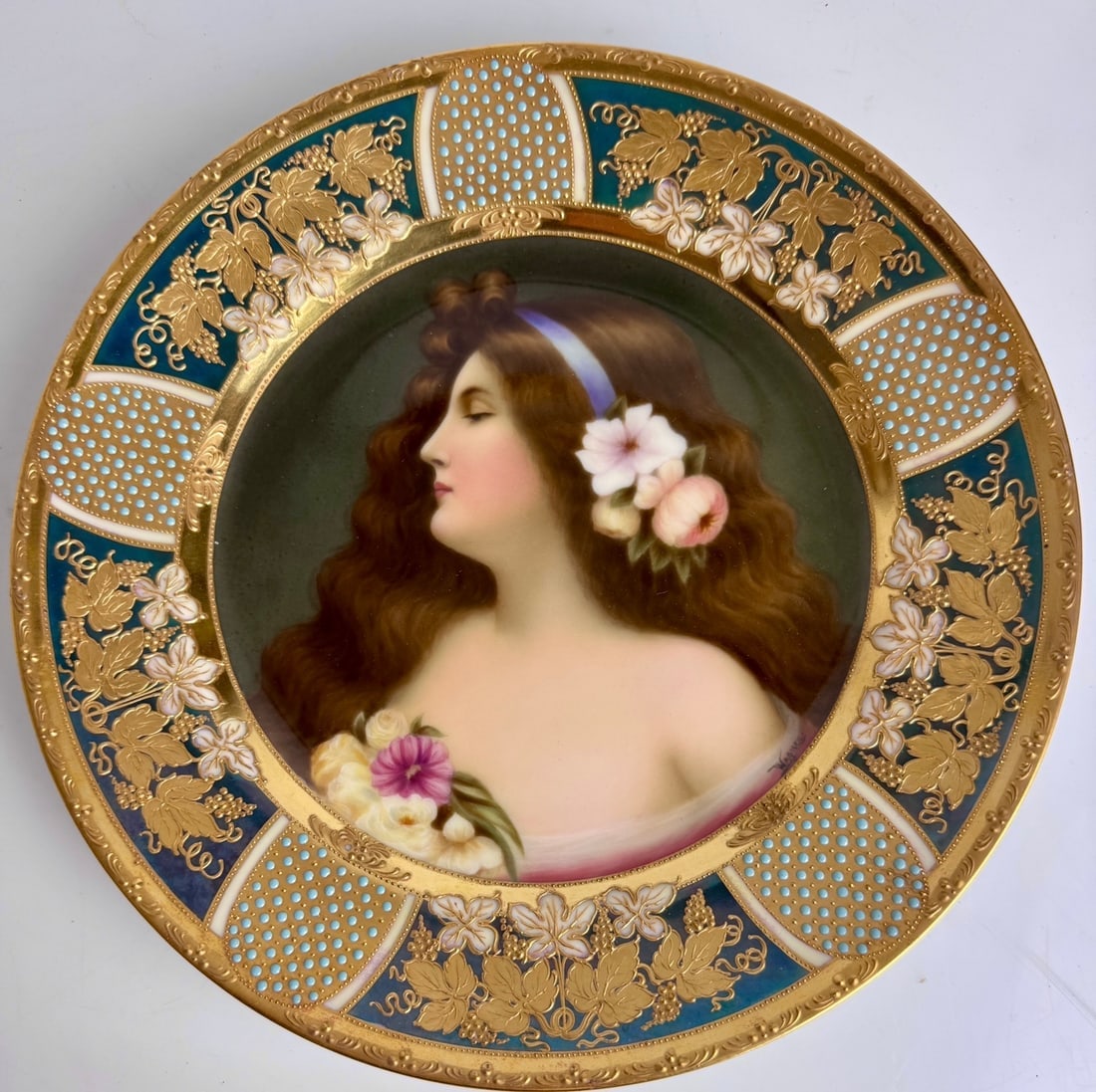 ART NOUVEAU ROYAL VIENNA JEWELLED PLATE WAGNER: Circa 1920. Measures 10.5 inches d. In excellent condition. No cracks, no breaks , no restoration.Estimate $1500-2000