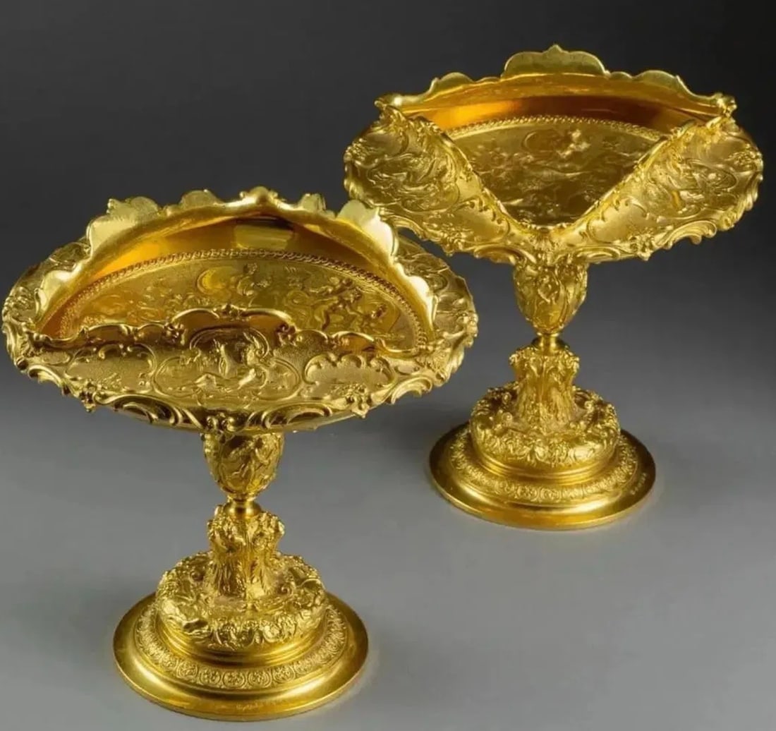 A PAIR OF SIGNED ELKINGTON DORE BRONZE TAZZAS: Circa 1900 , measure 7.5 inches high. Estimate $2.000-2.500