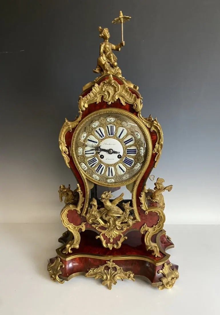 19TH C. ORMOLU MOUNTED FRENCH CHINOISERIE CLOCK: Measures 18 inches tall. In good condition. Estimate $2.500-3.000