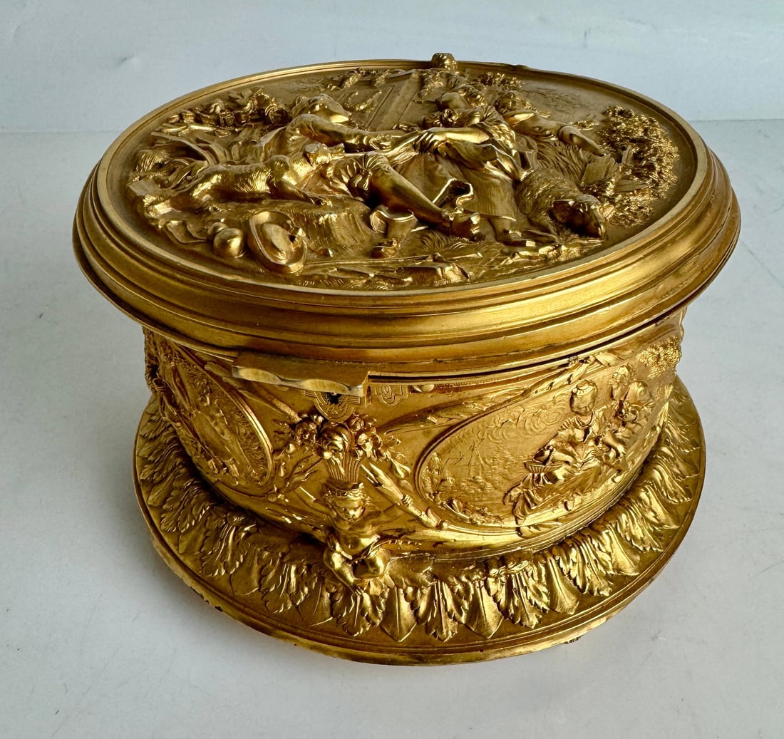 ORMOLU BOX: Circa 1900. Measures 8” d., 8” h. In good condition. Estimate $1000-1200