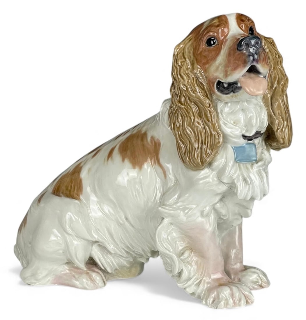 A VERY RARE LIFE SEIZE MODEL OF A MEISSEN SPANIEL DOG: Circa 1880. First quality cross swords mark. Measures 13 inches L., 15 inches High. Estimate $20000-30000. Please note you are bidding on the larger dog only.