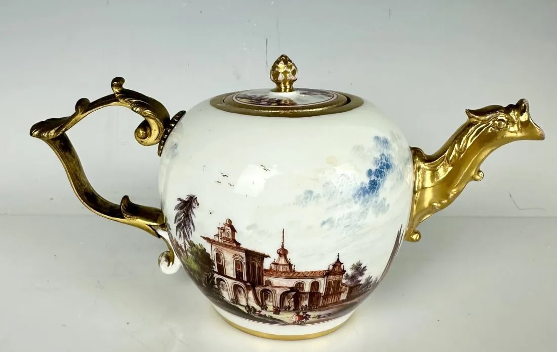 18TH C. MEISSEN TEA POT: With bronze handle , the teapot and the lid signed H in gold. Estimate $2.500-3.000