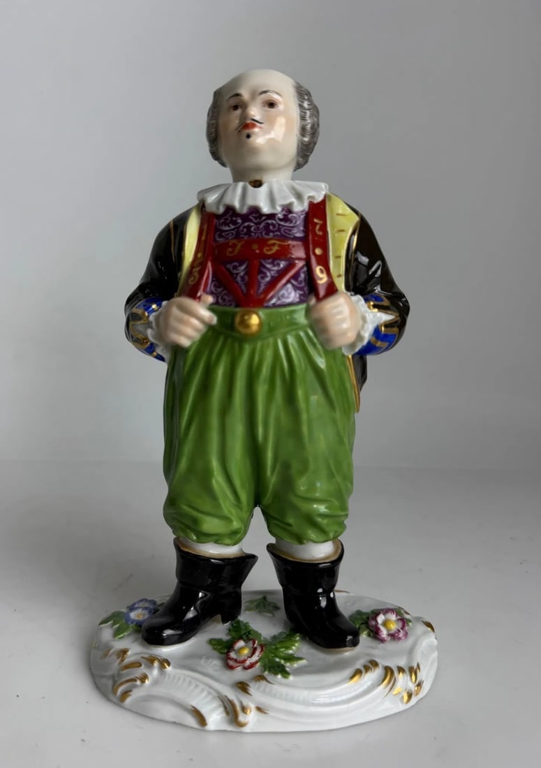 MEISSEN NODDER COURT JESTER: 19th/20th century, removable head, underglaze blue crossed swords mark and incised "1 34" to underside of base, approx. 7-3/8 x 4-1/2 x 3-1/4 in. In excellent condition.Estimate $3000-4000