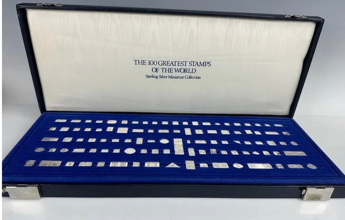 FRANKLIN MINT 100 GREATEST STAMPS OF THE WORLD: All sterling silver in original box. Estimate $800-1.000