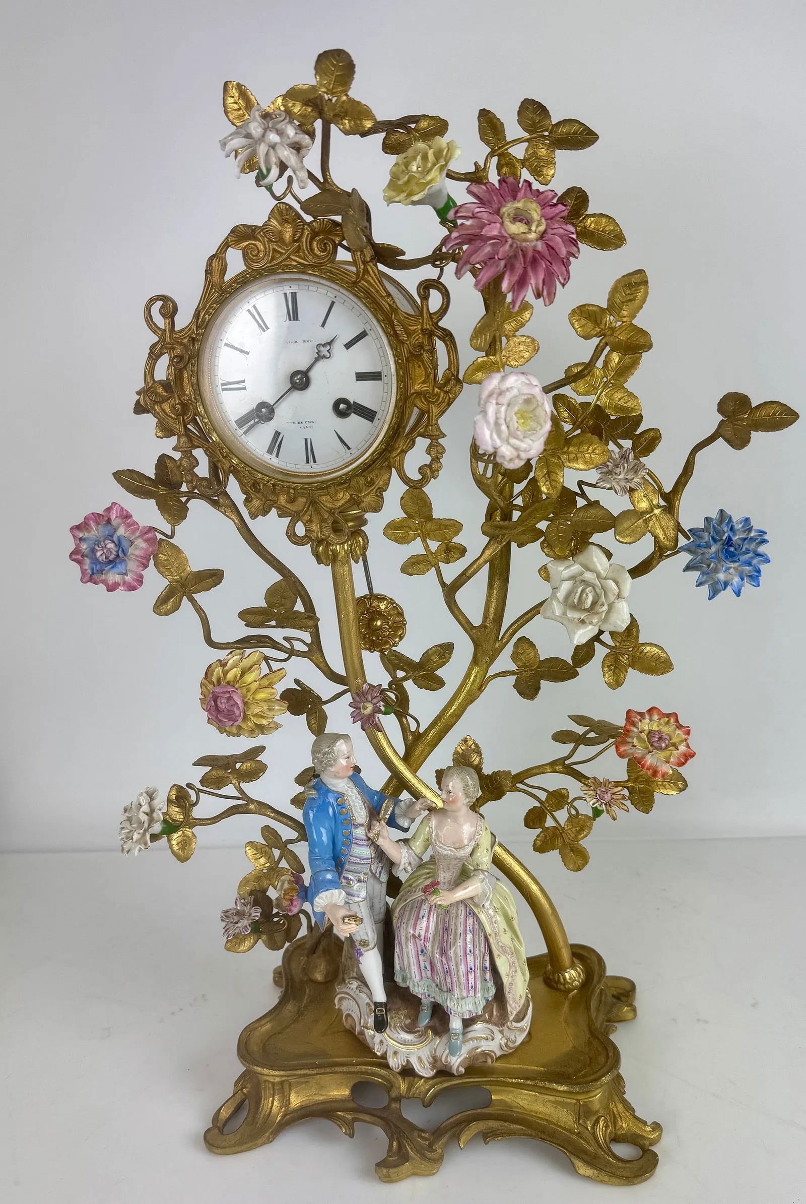 A LARGE ORMOLU MOUNTED MEISSEN CLOCK: Circa 1880. Taylor with first quality cross swords mark. Measures 22 inches high, 14 inches wide. In good condition.Estimate $4000-5000