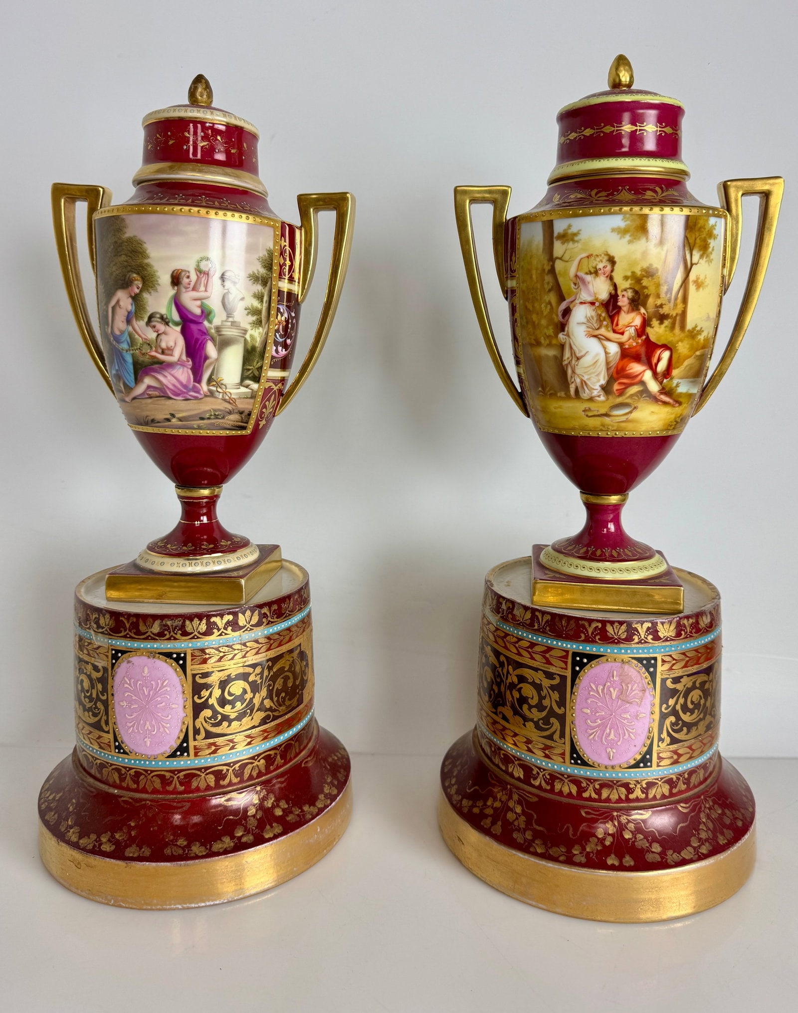 A LARGE NEAR PAIR ROYAL VIENNA VASES: Circa 1900. Measure 15.5” high. In overall good condition . Estimate $1000-1200